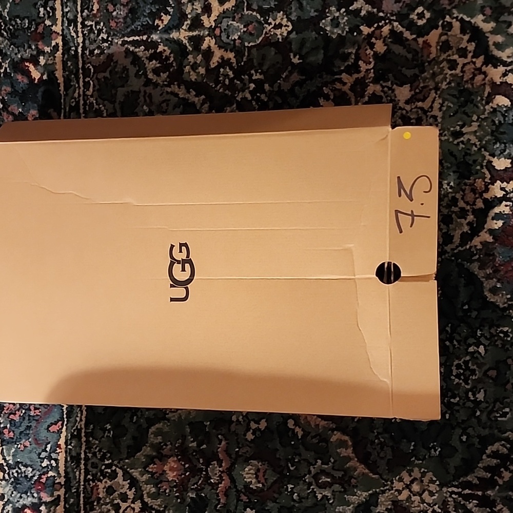 UGG BOOTS BARELY OVER THE KNEE. BRAND NEW SIZE 7.5 M Black